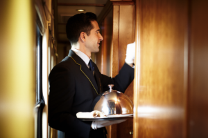 Butler service aboard the Costa Verde Express luxury train in Spain.